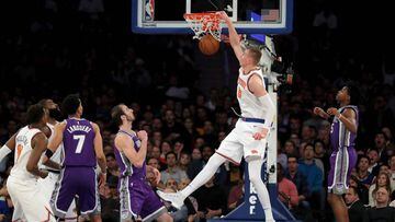 NEW YORK, NY - NOVEMBER 11: Kristaps Porzingis #6 of the New York Knicks dunks the ball against the Sacramento Kings in the first half during their game at Madison Square Garden on November 11, 2017 in New York City. NOTE TO USER: User expressly acknowled