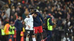 VALENCIA, SPAIN - JANUARY 26: Iñaki Williams of Athletic Club consolate Jose Luis Gaya of Valencia CF after the final whistle during the Copa Del Rey Quarter Final match between Valencia CF and Athletic Club  at Estadio Mestalla on January 26, 2023 in Valencia, Spain. (Photo by David Ramos/Getty Images)