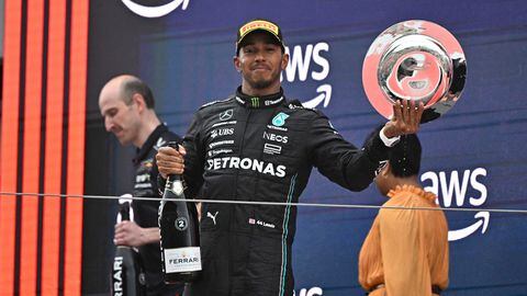 Second placed Mercedes' British driver Lewis Hamilton celebrates on the podium after the Spanish Formula One Grand Prix race at the Circuit de Catalunya on June 4, 2023 in Montmelo, on the outskirts of Barcelona. (Photo by JAVIER SORIANO / AFP)