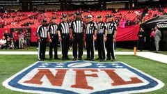 ATLANTA, GA - OCTOBER 23: Members of the NFL Referee crew Michael Banks #72, Greg Meyer #78, Bruce Stritesky #102, Phil McKinnely #110, Head Referee Bill Vinovich #52, Mark Perlman #9, and Gary Cavaletto #60 (L-R) pose for a photograph before the game between Atlanta Falcons and the San Diego Chargers before the game at the Georgia Dome on October 23, 2016 in Atlanta, Georgia.   Scott Cunningham/Getty Images/AFP == FOR NEWSPAPERS, INTERNET, TELCOS &amp; TELEVISION USE ONLY ==