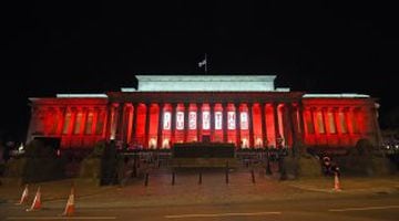 St George's Hall bathed in red and white. A service will be held there on Wednesday.