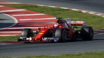 Ferrari driver Sebastian Vettel of Germany takes a curve during a Formula One pre-season testing session at the Catalunya racetrack in Montmelo, outside Barcelona, Spain, Wednesday, March 1, 2017. (AP Photo/Francisco Seco)
