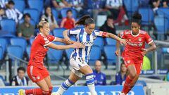 SAN SEBASTIAN, SPAIN - SEPTEMBER 20: Linda Dallmann of Bayern Muenchen, Tainara de Souza da Silva of Bayern Muenchen and Nerea Eizagirre of Real Sociedad battle for the ball during the UEFA Women´s Champions League Second Qualifying Round First Leg match between Real Sociedad and Bayern München at Reale Arena on September 20, 2022 in San Sebastian, Spain. (Photo by Juan Lazkano/DeFodi Images via Getty Images)