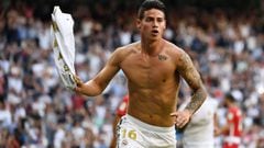 Real Madrid&#039;s Colombian midfielder James Rodriguez celebrates scoring his team&#039;s fourth goal during the Spanish league football match between Real Madrid CF and Granada FC at the Santiago Bernabeu stadium in Madrid on October 5, 2019. (Photo by 