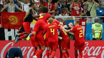 Belgium&#039;s midfielder Nacer Chadli (hidden) celebrates with teammates after scoring during the Russia 2018 World Cup round of 16 football match between Belgium and Japan at the Rostov Arena in Rostov-On-Don on July 2, 2018. / AFP PHOTO / Odd ANDERSEN 