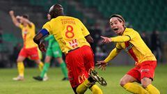 Lens&#039; Ivorian midfielder Seko Fofana (C) celebrates next to Lens&#039; Norwegian midfielder Patrick Berg after scoring a goal during the French L1 football match between AS Saint-Etienne and Lens (RCL) at the Geoffroy-Guichard stadium in Saint-Etienn