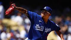 LOS ANGELES, CALIFORNIA - AUGUST 13: Julio Urias #7 of the Los Angeles Dodgers throws against the Colorado Rockies in the first inning at Dodger Stadium on August 13, 2023 in Los Angeles, California.   Ronald Martinez/Getty Images/AFP (Photo by RONALD MARTINEZ / GETTY IMAGES NORTH AMERICA / Getty Images via AFP)