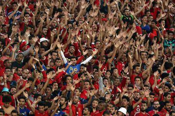 Al-Ahly supporters cheer for their team during the CAF Champions League final football match between Al-Ahly vs Wydad Casablanca at the Borg El Arab Stadium in Alexandria on October 28, 2017.