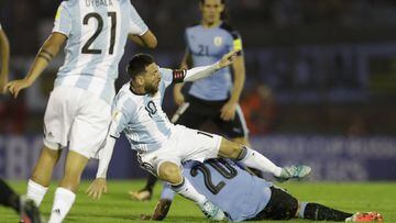 Argentina&#039;s Lionel Messi is fouled by Uruguay&#039;s Alvaro Gonzalez during a 2018 World Cup qualifying soccer match in Montevideo, Uruguay, Thursday, Aug. 31, 2017.(AP Photo/Natacha Pisarenko)