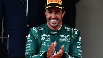 Second-placed Aston Martin's Spanish driver Fernando Alonso reacts on the podium after the  Formula One Monaco Grand Prix at the Monaco street circuit in Monaco, on May 28, 2023. (Photo by Jeff PACHOUD / AFP)