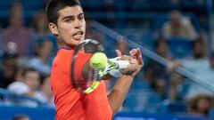 Aug 19, 2022; Cincinnati, OH, USA; Carlos Alcaraz (ESP) returns a shot during his match against Cameron Norrie (GBR) at the Western & Southern Open at the Lindner Family Tennis Center. Mandatory Credit: Susan Mullane-USA TODAY Sports