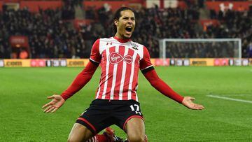(FILES) This file photo taken on December 28, 2016 shows Southampton&#039;s Dutch defender Virgil van Dijk celebrates scoring the opening goal during the English Premier League football match between Southampton and Tottenham Hotspur at St Mary&#039;s Sta