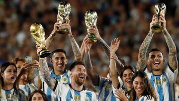 FILE PHOTO: Soccer Football - International Friendly - Argentina v Panama - Estadio Monumental, Buenos Aires, Argentina - March 23, 2023 Argentina's Lionel Messi and team mates celebrate with their families and World Cup trophies after the match REUTERS/Agustin Marcarian/File Photo
