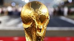 DOHA, QATAR - NOVEMBER 21: The FIFA World Cup trophy is pictured on the grid before the F1 Grand Prix of Qatar at Losail International Circuit on November 21, 2021 in Doha, Qatar. (Photo by Mark Thompson/Getty Images)