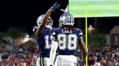 TAMPA, FLORIDA - JANUARY 16: CeeDee Lamb #88 of the Dallas Cowboys celebrates with Michael Gallup #13 after scoring a touchdown against the Tampa Bay Buccaneers during the fourth quarter in the NFC Wild Card playoff game at Raymond James Stadium on January 16, 2023 in Tampa, Florida.   Mike Ehrmann/Getty Images/AFP (Photo by Mike Ehrmann / GETTY IMAGES NORTH AMERICA / Getty Images via AFP)