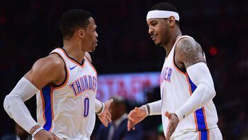 LOS ANGELES, CA - JANUARY 04: Carmelo Anthony #7 of the Oklahoma City Thunder celebrates his three pointer with Russell Westbrook #0 during a 127-117 win over the LA Clippers at Staples Center on January 4, 2018 in Los Angeles, California.   Harry How/Getty Images/AFP == FOR NEWSPAPERS, INTERNET, TELCOS &amp; TELEVISION USE ONLY ==