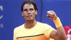 Nadal clenches fist in celebration after beating Kohlschreber 