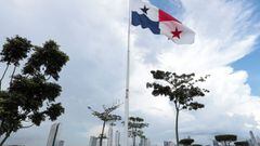 A Panamanian flag flutters with the skyline of the city in the background, in Panama City, Panama October 4, 2021. REUTERS/Erick Marciscano