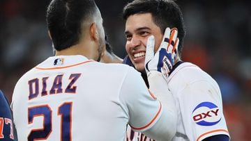 Houston Astros center fielder Mauricio Dubon (14) makes a catch to