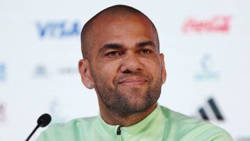 DOHA, QATAR - DECEMBER 01: Dani Alves of Brazil reacts  during the Brazil Press Conference at the Main Media Center on December 01, 2022 in Doha, Qatar. (Photo by Mohamed Farag/Getty Images)