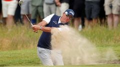FILE PHOTO: Golf - The 149th Open Championship - Royal St George's, Sandwich, Britain - July 16, 2021 Phil Mickelson of the U.S. plays out of a bunker on the 1st hole during the second round REUTERS/Lee Smith/File Photo