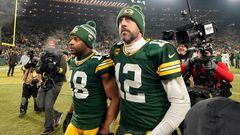 GREEN BAY, WISCONSIN - JANUARY 08: Aaron Rodgers #12 and Randall Cobb #18 of the Green Bay Packers walk off the field after losing to the Detroit Lions at Lambeau Field on January 08, 2023 in Green Bay, Wisconsin.   Patrick McDermott/Getty Images/AFP (Photo by Patrick McDermott / GETTY IMAGES NORTH AMERICA / Getty Images via AFP)