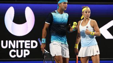 PERTH, AUSTRALIA - DECEMBER 30: Tomas Martin Etcheverry and Nadia Podoroska of Argentina talk tactics in the mixed doubles match against Caroline Garcia and Edouard Roger-Vasselin of France during day two of the 2023 United Cup at RAC Arena on December 30, 2022 in Perth, Australia. (Photo by Paul Kane/Getty Images)