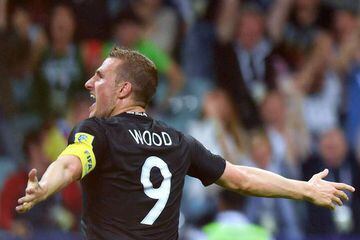 Wood celebrates after scoring the opening goal for New Zealand.