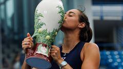 Caroline Garcia of France poses with the winner's trophy after beating Petra Kvitova of the Czech Republic in the final of the women's singles at the Lindner Family Tennis Center on August 21, 2022 in Mason, Ohio.