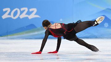 Russia&#039;s Kamila Valieva falls as she competes in the women&#039;s single skating free skating of the figure skating event during the Beijing 2022 Winter Olympic Games at the Capital Indoor Stadium in Beijing on February 17, 2022. (Photo by Manan VATS