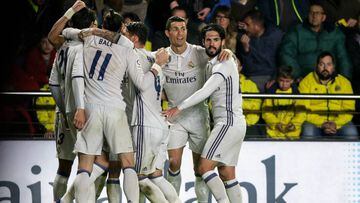 Real Madrid players celebrate their goal during the Spanish League football match Villarreal CF vs Real Madrid at El Madrigal stadium in Vila-real on February 26, 2017. 