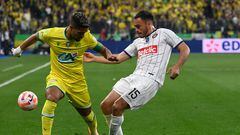 Nantes' French midfielder Ludovic Blas (L) fight for the ball with Toulouse's Chilean defender Gabriel Suazo during the French Cup final football match between Nantes (FC) and Toulouse (FC) at the Stade de France, in Saint-Denis, on the outskirts of Paris, on April 29, 2023. (Photo by Alain JOCARD / AFP)