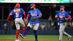 Puerto Rico's players celebrate winning at the end of the Caribbean Series baseball game between Puerto Rico and Mexico at LoanDepot Park in Miami, Florida, on February 2, 2024. (Photo by CHANDAN KHANNA / AFP)