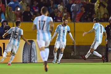 Argentina's Lionel Messi (2-R) celebrates after scoring against Ecuador during their 2018 World Cup qualifier football match in Quito, on October 10, 2017