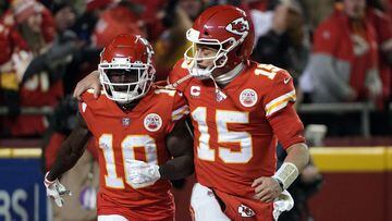 Jan 23, 2022; Kansas City, Missouri, USA; Kansas City Chiefs wide receiver Tyreek Hill (10) celebrates his touchdown with quarterback Patrick Mahomes (15) against the Buffalo Bills during the second half of the AFC Divisional playoff football game at GEHA