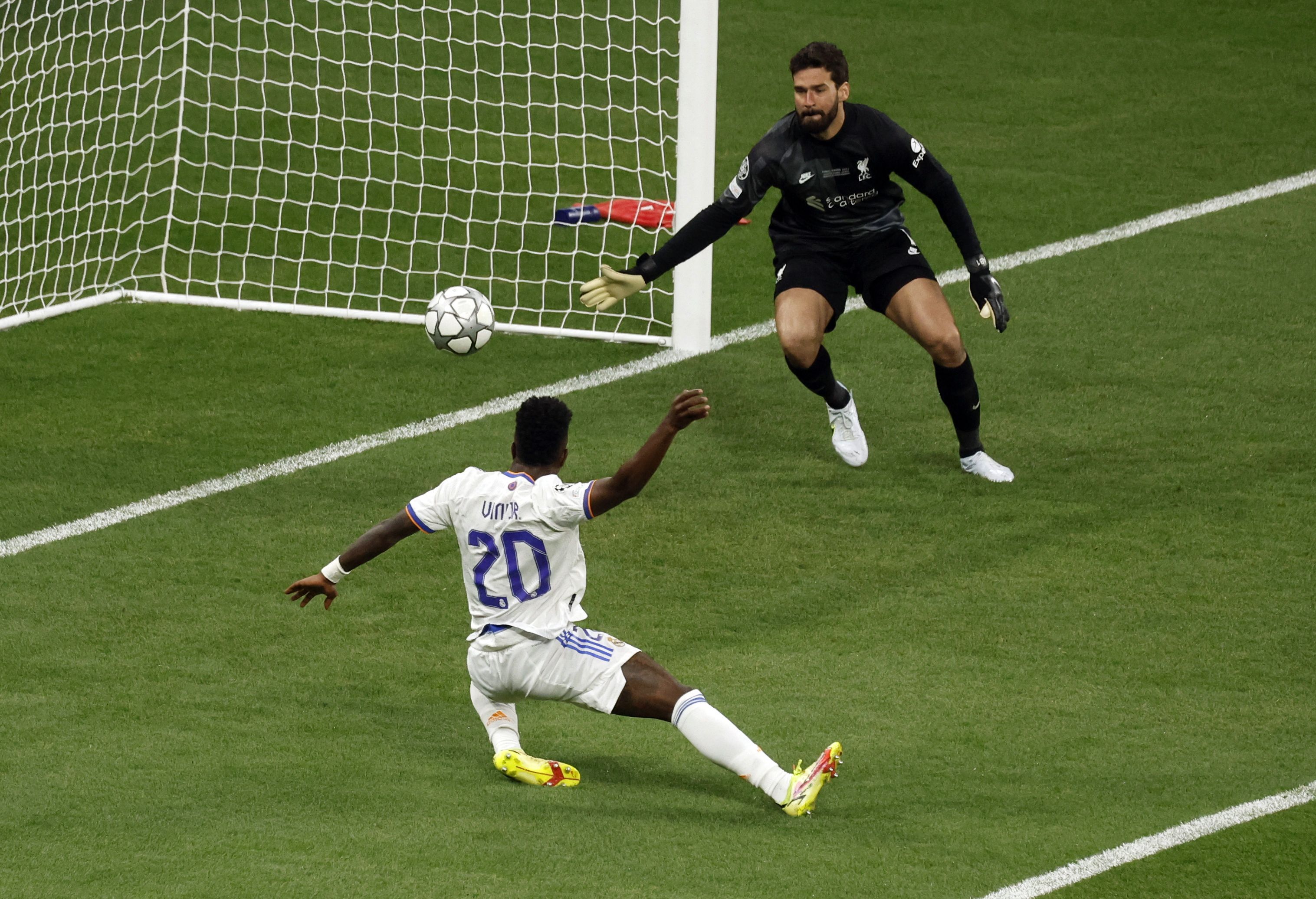 Soccer Football - Champions League Final - Liverpool v Real Madrid - Stade de France, Saint-Denis near Paris, France - May 28, 2022  Real Madrid's Vinicius Junior scores their first goal REUTERS/Gonzalo Fuentes