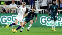 Megan Rapinoe #15 of the United States controls the ball against Lina Magull #20 of Germany during the second half during the women's international friendly match between United States and Germany at DRV PNK Stadium on November 10, 2022