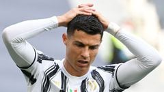 Juventus&#039; Portuguese forward Cristiano Ronaldo reacts during the Italian Serie A football match Juventus vs Inter on May 15, 2021 at the Juventus stadium in Turin. (Photo by Isabella BONOTTO / AFP)