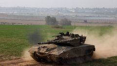 An Israeli tank manoeuvres near the Israel-Gaza border, amid the ongoing conflict between Israel and the Palestinian Islamist group Hamas, in southern Israel, December 27, 2023. REUTERS/Amir Cohen