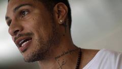 Peru national soccer team captain Paolo Guerrero talks during an interview with Reuters in Rio de Janeiro, Brazil December 21, 2017. His tattoo reads &quot;Faith&quot;. REUTERS/Ricardo Moraes