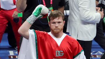 LAS VEGAS, NEVADA - SEPTEMBER 17: Canelo Alvarez gestures to fans after entering the ring for his super middleweight title fight against Gennadiy Golovkin at T-Mobile Arena on September 17, 2022 in Las Vegas, Nevada. Alvarez retained his titles with a unanimous-decision victory.   Ethan Miller/Getty Images/AFP
