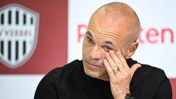 Spanish footballer Andres Iniesta, former Barcelona star and a present midfielder with Japanese club Vissel Kobe, reacts as he speaks during a press conference in Kobe on May 25, 2023. (Photo by Yuichi YAMAZAKI / AFP)