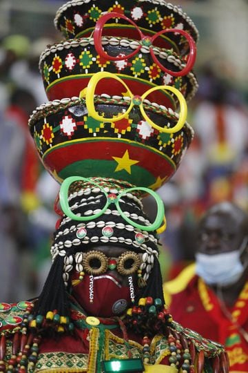 Soccer Football - Africa Cup of Nations - Group A - Cape Verde v Burkina Faso - Stade d'Olembe, Yaounde, Cameroon - January 13, 2022 Burkina Faso fan wearing a large hat inside the stadium REUTERS/Mohamed Abd El Ghany