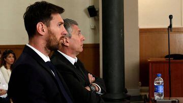 Barcelona&#039;s Argentine soccer player Lionel Messi (L) sits in court with his father Jorge Horacio Messi during their trial for tax fraud in Barcelona, Spain, June 2, 2016. REUTERS/Alberto Estevez/Pool/Files     TPX IMAGES OF THE DAY     