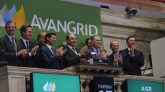 FILE PHOTO: Chairman of the Board of Directors of Avangrid, Inc., Ignacio Galan (C), applauds with United Illuminating President and CEO James P. Torgerson (4th L) as they ring the opening bell above the floor of the New York Stock Exchange (NYSE) before 