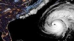 This National Oceanic and Atmospheric Administration (NOAA) satellite handout image shows Hurricane Fiona on September 23, 2022, at 01h21UTC. - Gusts of 100 miles an hour and driving rain buffeted Bermuda early Friday, leaving thousands without power and fearing coastal damage as Fiona, a powerful Category 3 storm, slid past the Atlantic island. At 6:00 am local time (0900 GMT), Fiona&#039;s center was located about 155 miles (250 kilometers) northwest of the British territory, according to the US National Hurricane Center. (Photo by Handout / various sources / AFP) / RESTRICTED TO EDITORIAL USE - MANDATORY CREDIT &quot;AFP PHOTO /NOAA/GOES &quot; - NO MARKETING - NO ADVERTISING CAMPAIGNS - DISTRIBUTED AS A SERVICE TO CLIENTS