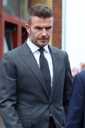 Beckham abandona la corte muy serio.