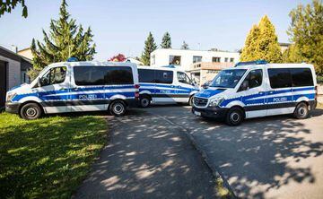 Police cars are seen in Rottenburg am Neckar, on April 21, 2017 following an arrest of a German-Russian man in connection with the bomb attack on Dortmund's team bus.