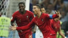 Portugal&#039;s forward Cristiano Ronaldo celebrates his third goal during the Russia 2018 World Cup Group B football match between Portugal and Spain at the Fisht Stadium in Sochi on June 15, 2018. / AFP PHOTO / Odd ANDERSEN / RESTRICTED TO EDITORIAL USE