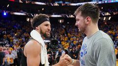 May 26, 2022; San Francisco, California, USA; Dallas Mavericks guard Luka Doncic (77) with Golden State Warriors guard Klay Thompson (11) after game five of the 2022 western conference finals against the Dallas Mavericks at Chase Center. Mandatory Credit:
